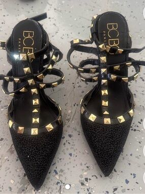 BCBG Black Pointed-Toe Strappy Pumps with Gold Studs